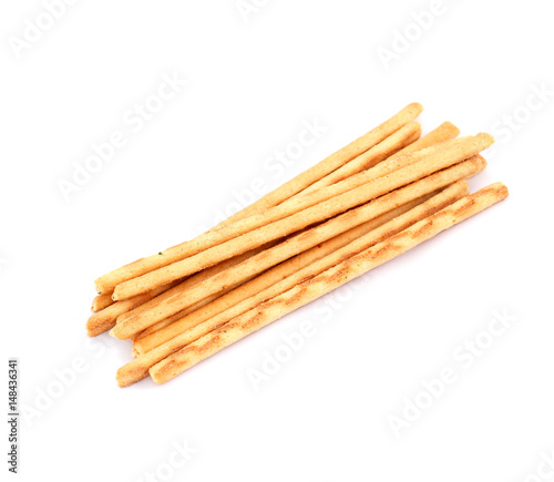 Heap of salty sticks isolated on white background