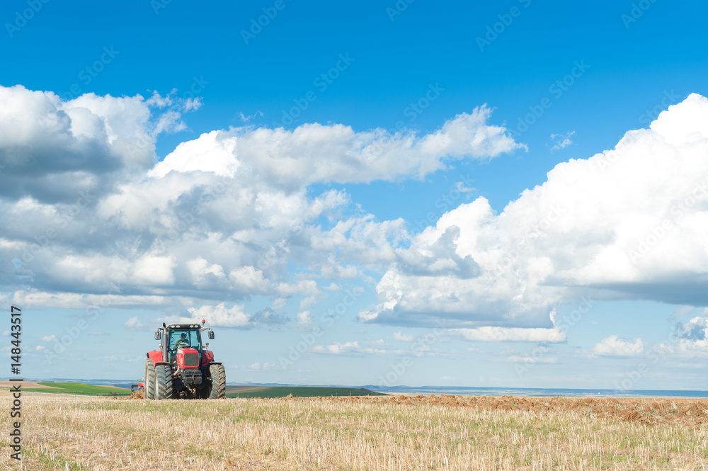 agricultural machinery working the land in the field. agricultural machinery working the land in the field.