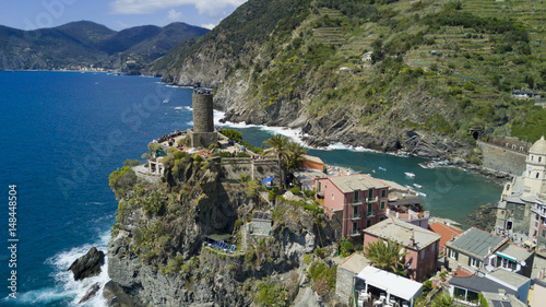 Aerial photo with drone on Vernazza, one of the famous Cinqueterre country, small village with colored houses on the cliff over the sea