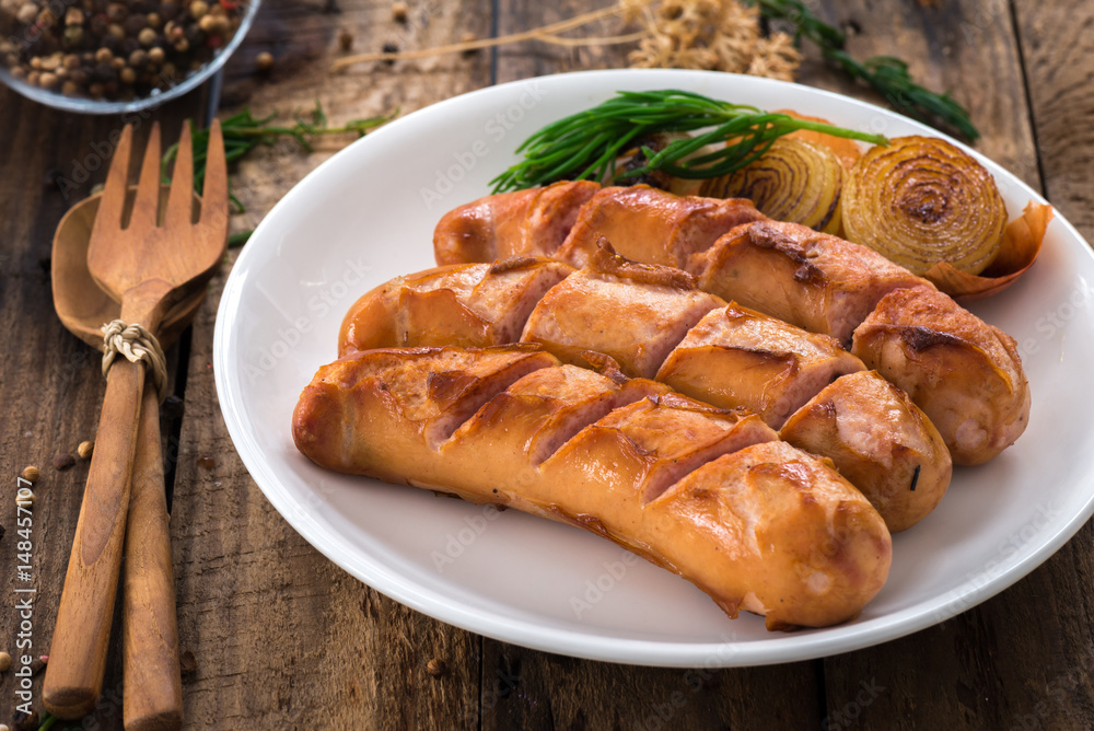 sausages with white plate on wood sausages with white plate on wood