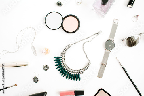 Beauty blog concept. Female make up accessories: watches, necklace, lipstick, shoes, sunglasses on white background. Flat lay, top view trendy fashion feminine background.