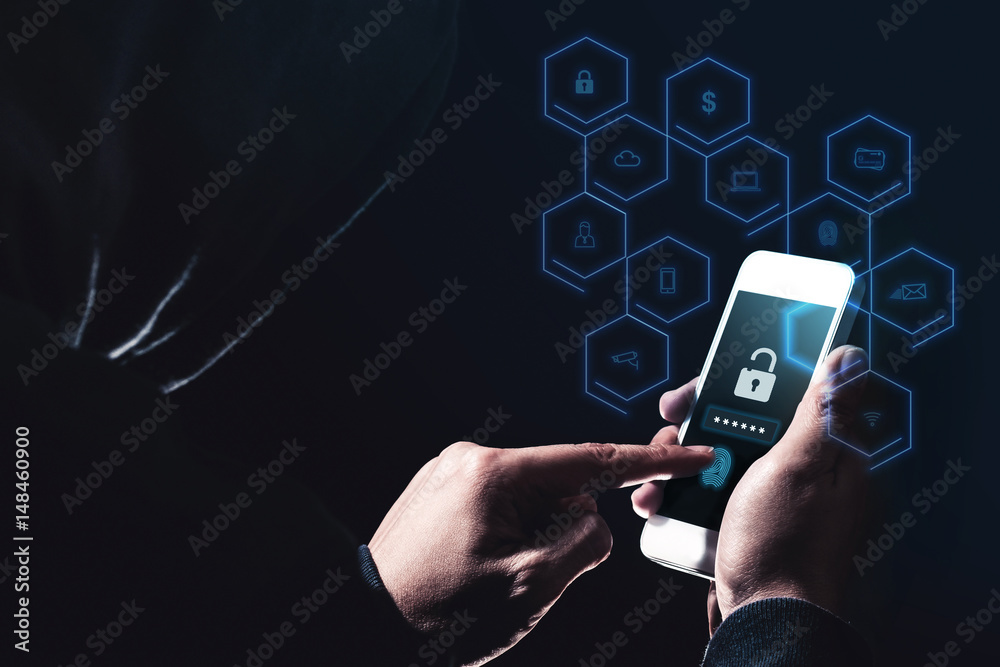 Hooded cyber crime hacker using mobile phone with icon diagram features  hacking in to cyberspace stealing online personal data, Security on  internet concept Photos | Adobe Stock