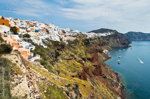Caldera coastline with Oia village cityscape at Santorini island, Greece