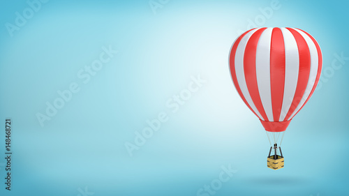 One red and white striped air balloon with an empty basket on blue background.