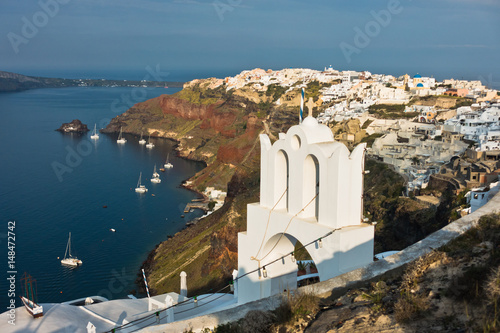 Caldera coastline with Oia village cityscape at Santorini island  Greece