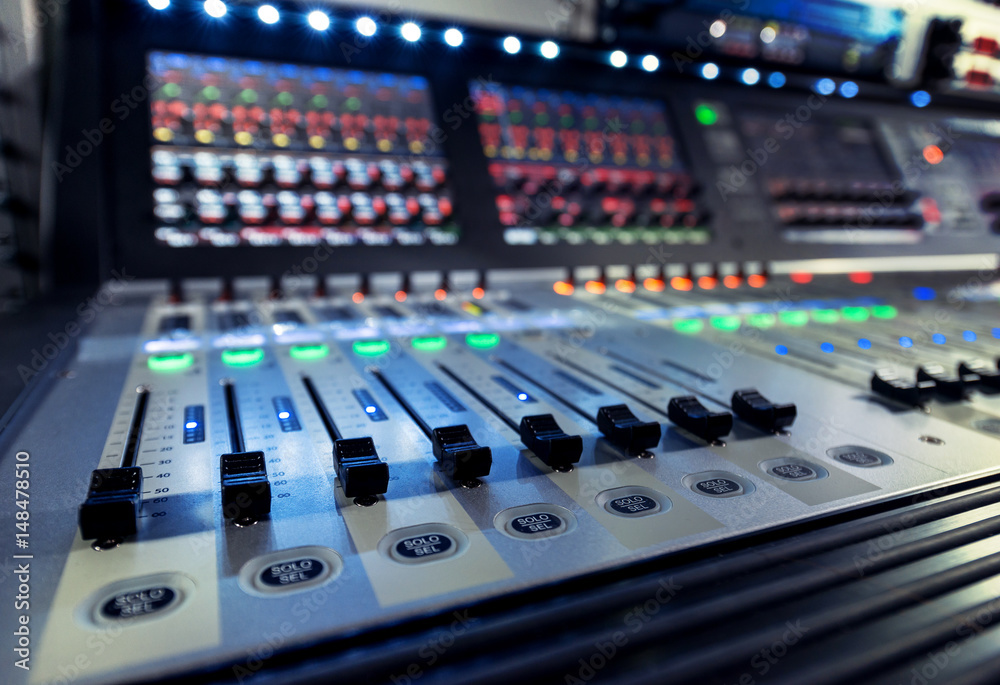 control panel of the sound engineer with the mixers on the television studio