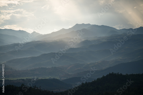 Mountain layer with sun light ray in Chiang mai , Thailand.