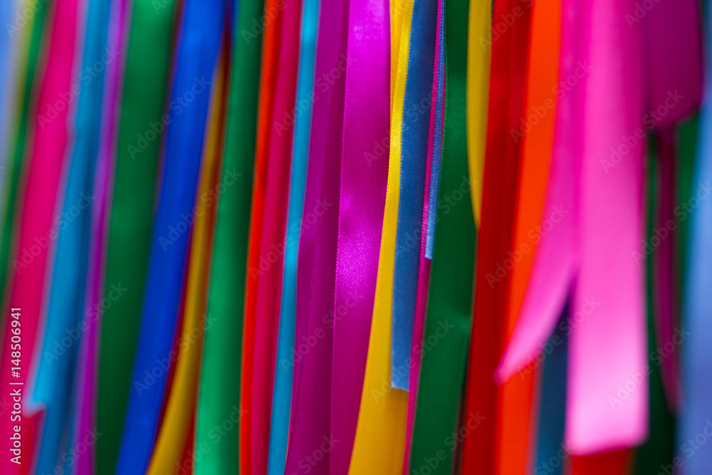 Variety of satin ribbons in different colors and lengths Variety of satin ribbons in different colors and lengths