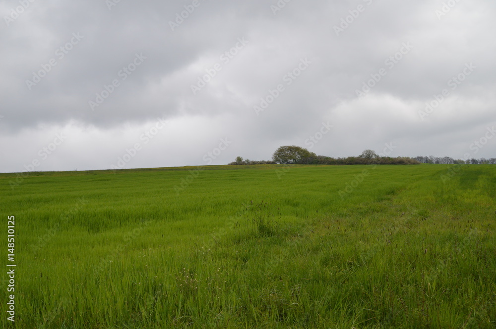 Obraz premium Wolken überm Land