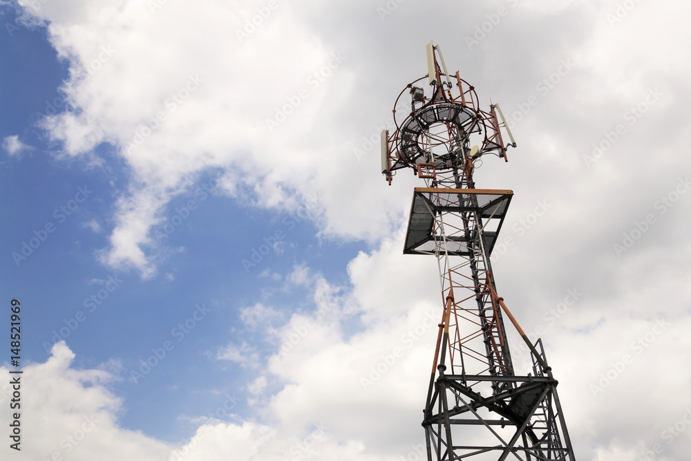Transmitters and aerials on telecommunication tower during sunset Transmitters and aerials on telecommunication tower during sunset