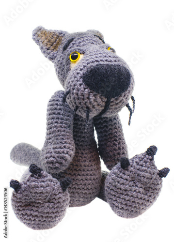 Knitted gray wolf toy
