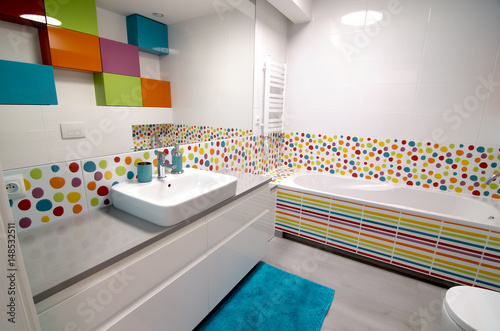 Interior of modern colourful bathroom photo