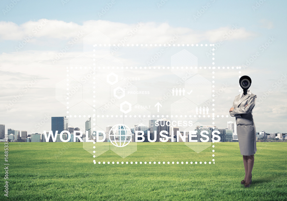 Camera headed woman standing on green grass against modern citys