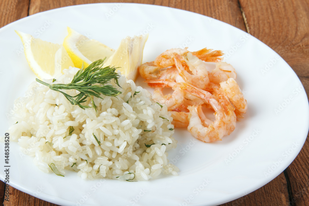 Mediterranean dish of shrimps with rice. Dish of fresh, ecological clean products Mediterranean dish of shrimps with rice. Dish of fresh, ecological clean products
