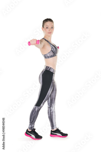 Young girl lifting weights