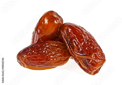 Heap of dried date fruit isolated on white background