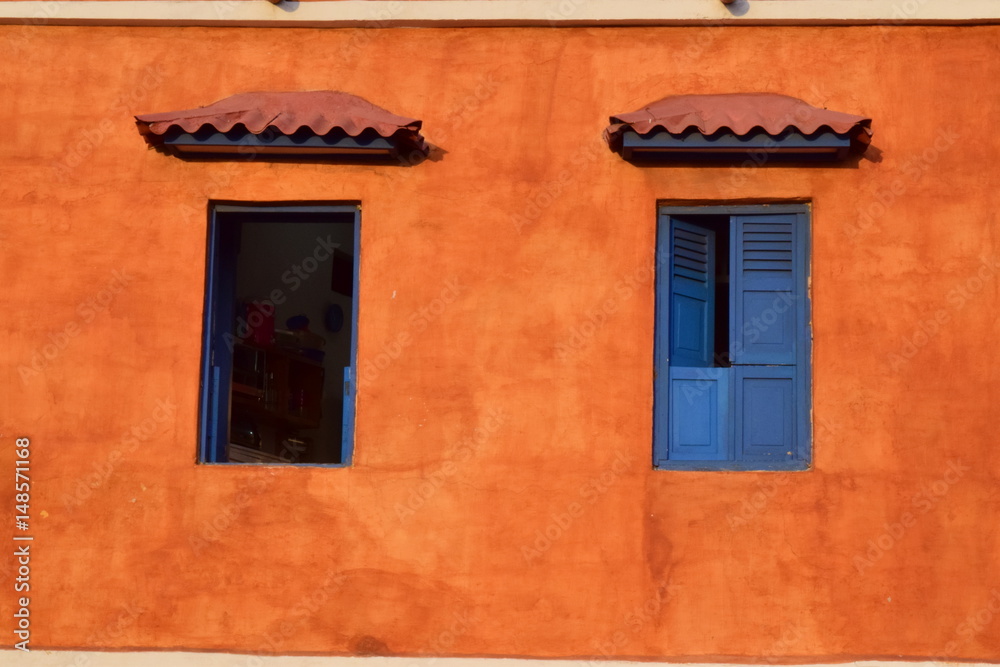 blue windows orange wall
