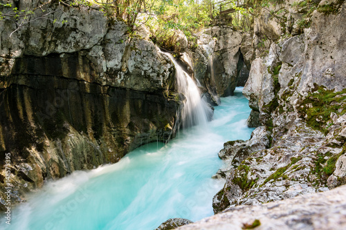 Narrow part od river Soca and small waterfalls in Triglav national park after heavy rain as the water level is still high