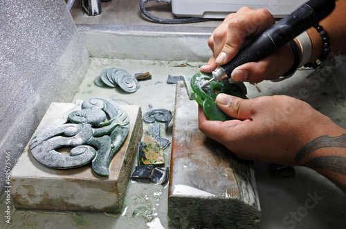 Konstfotografi Hands of a Jade ornamental green rock carver at work
