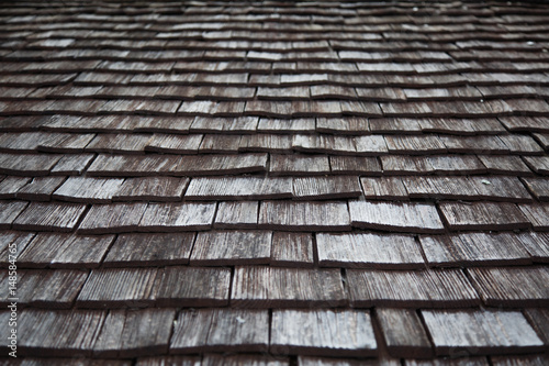 Traditional wooden shingles roof of an Austrian house.