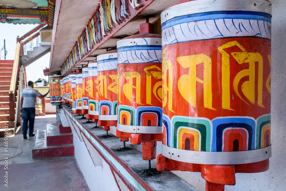 Obraz premium Prayer wheels, at selective focus, at Zang Dhok Palri Phodang, a Buddhist monastery in Kalimpong in West Bengal, India.
