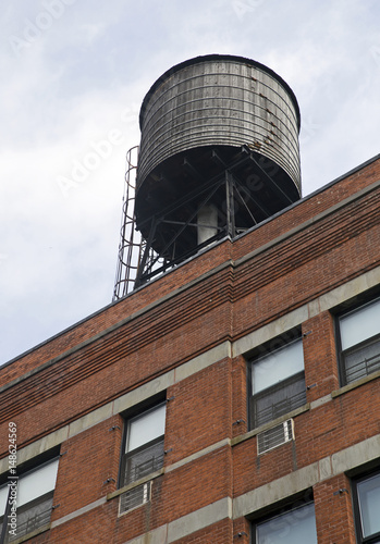 Rooftop typical water tank in New York city, USA