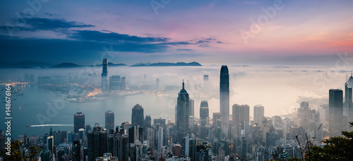 Misty City and Harbor at Sunrise - Victoria Harbor of Hong Kong