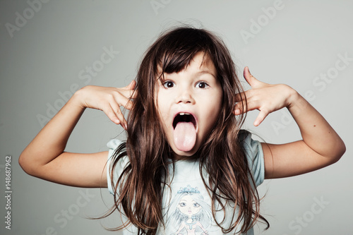 Girl showing tongue 