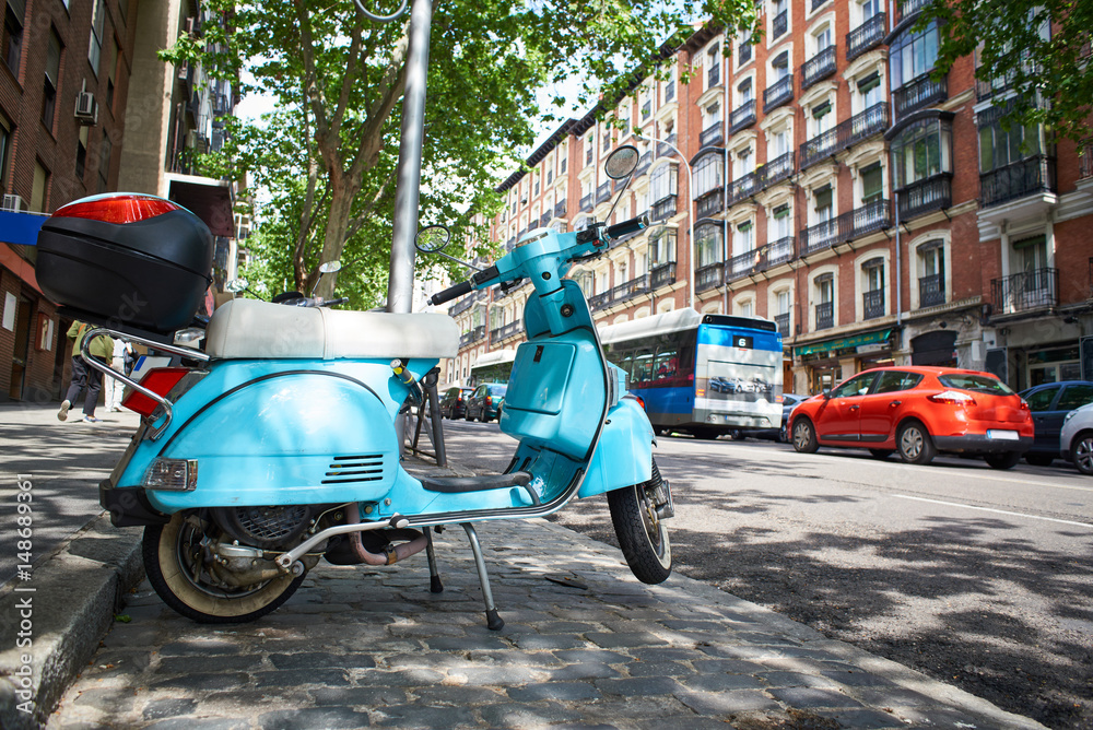 Vintage scooter on city street