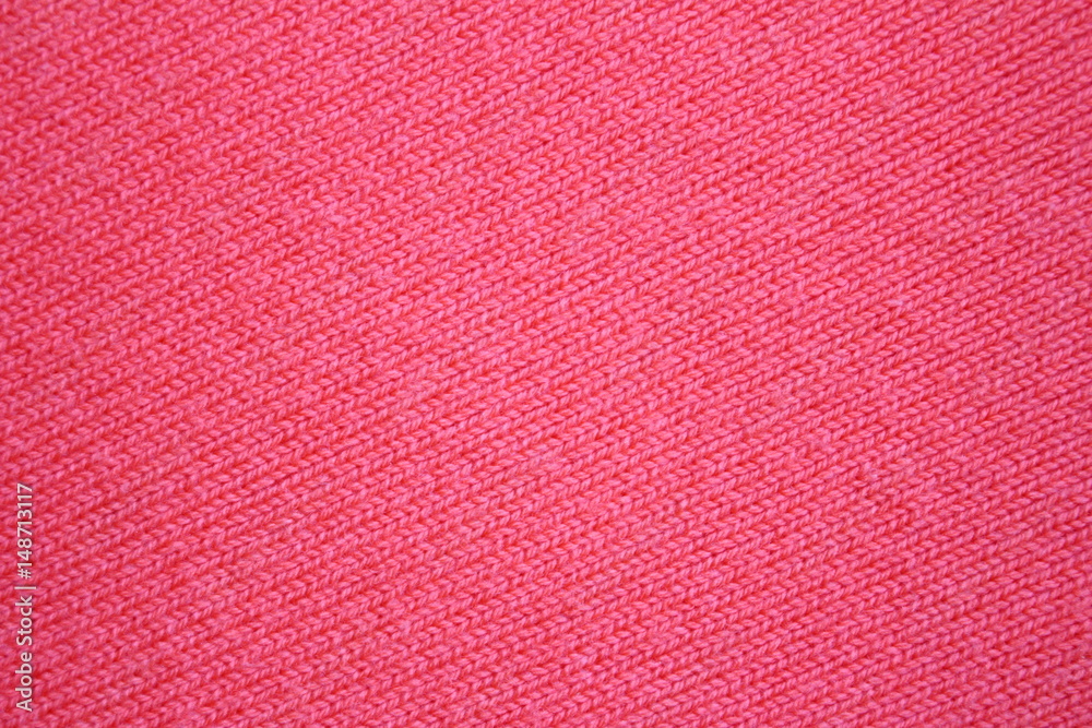 текстура однотонной  вязаной ткани , красного цвета    