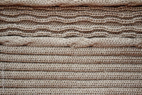 текстура однотонной вязаной ткани , коричневого цвета 