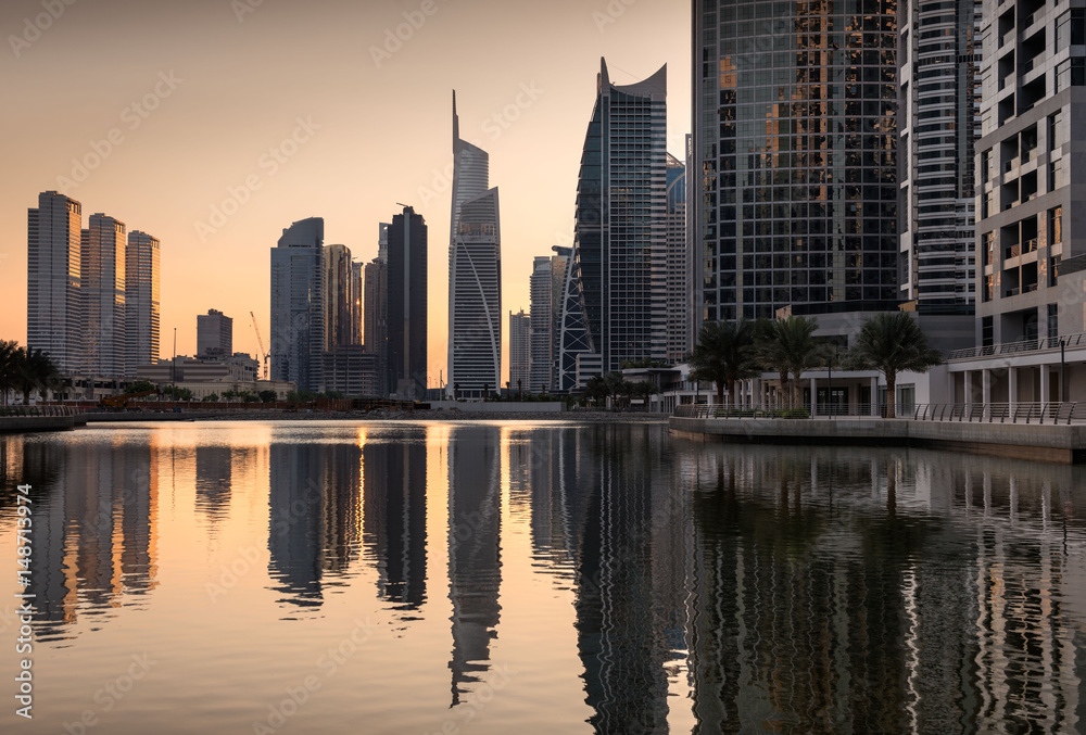 Refelctions of Jumeirah lakes towers at dusk, Dubai, United Arab Emirates