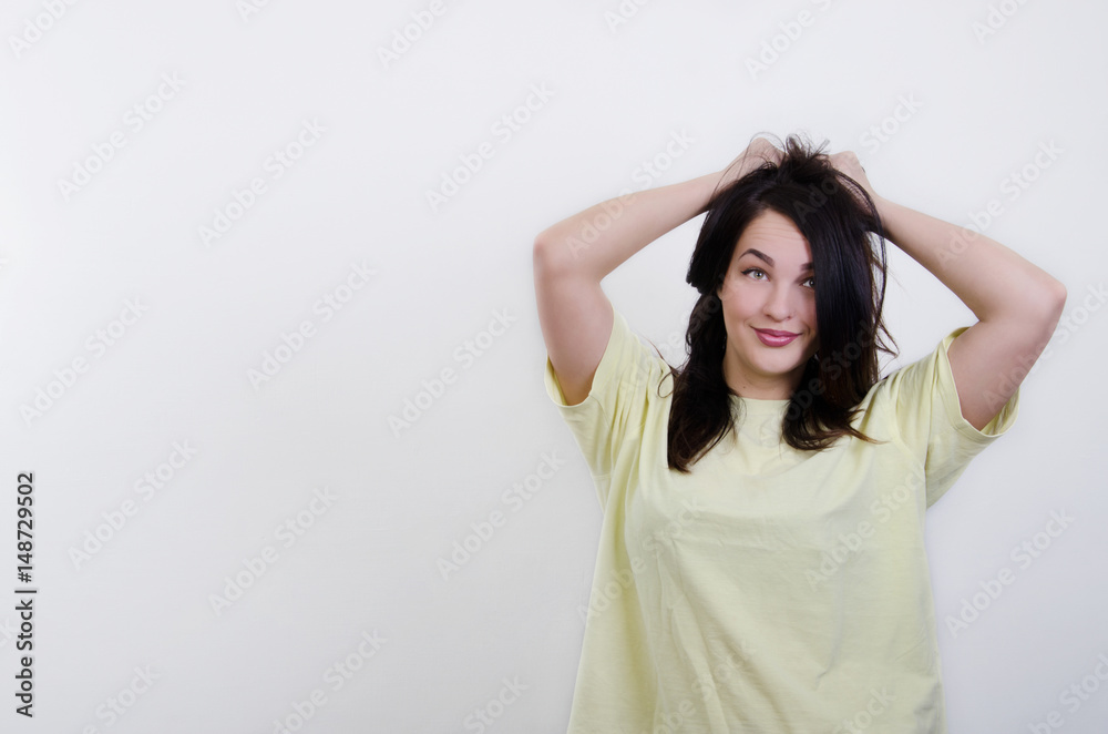 a girl is in a yellow shirt