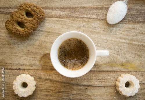 top view of espresso coffee with biscuits