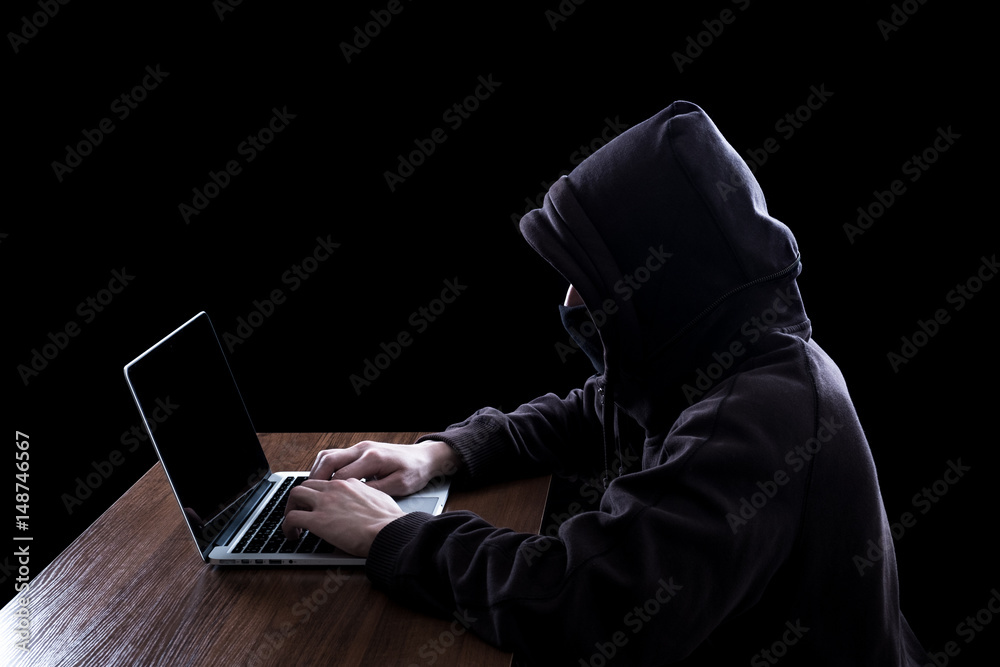 Anonymous hacker in the dark Anonymous hacker in the dark