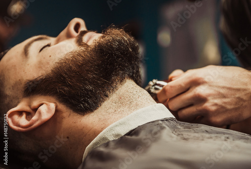 Barber's beard cuts a hipster