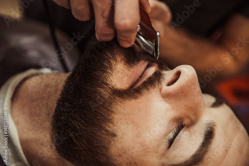 Barber's beard cuts a hipster