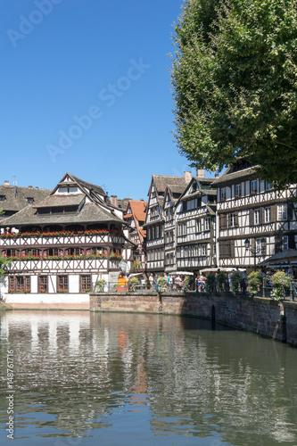 STRASBOURG, FRANCE - August 23, 2016 : Street view of Traditional houses in Strasbourg, Alsace. is the official seat of the European Parliament, Located close to the border with Germany