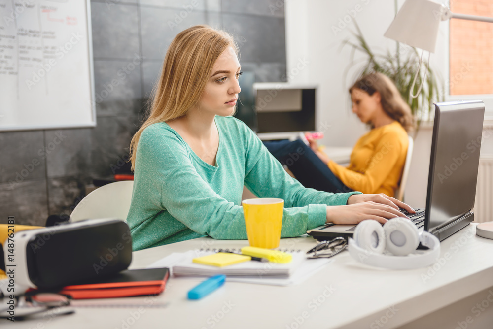 Young business woman using laptop Young business woman using laptop