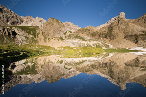 Reflection in Alpine lake