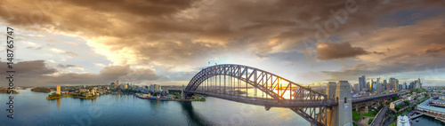Sydney Harbour Bridge at sunset, panoramic view from the sky