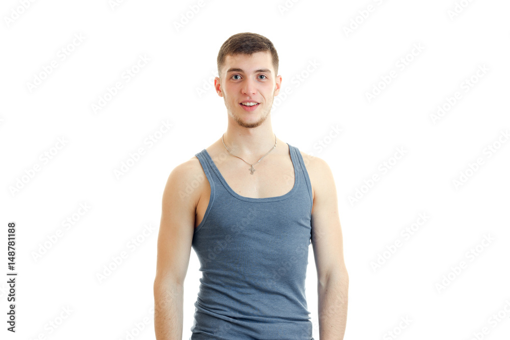 young guy in the gray shirt posing on camera young guy in the gray shirt posing on camera