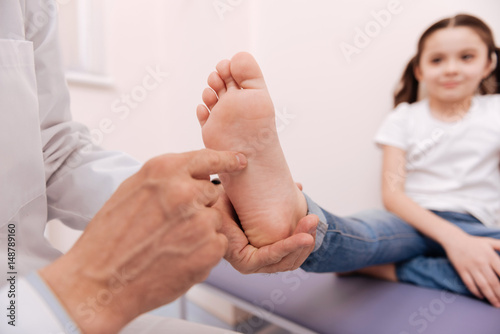 Cuadro en lienzo Scrupulous prominent doctor running a checkup