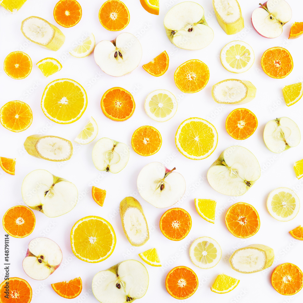 Food pattern of fresh fruit in a cut. Oranges, lemons, bananas, tangerines. Food pattern of fresh fruit in a cut. Oranges, lemons, bananas, tangerines.