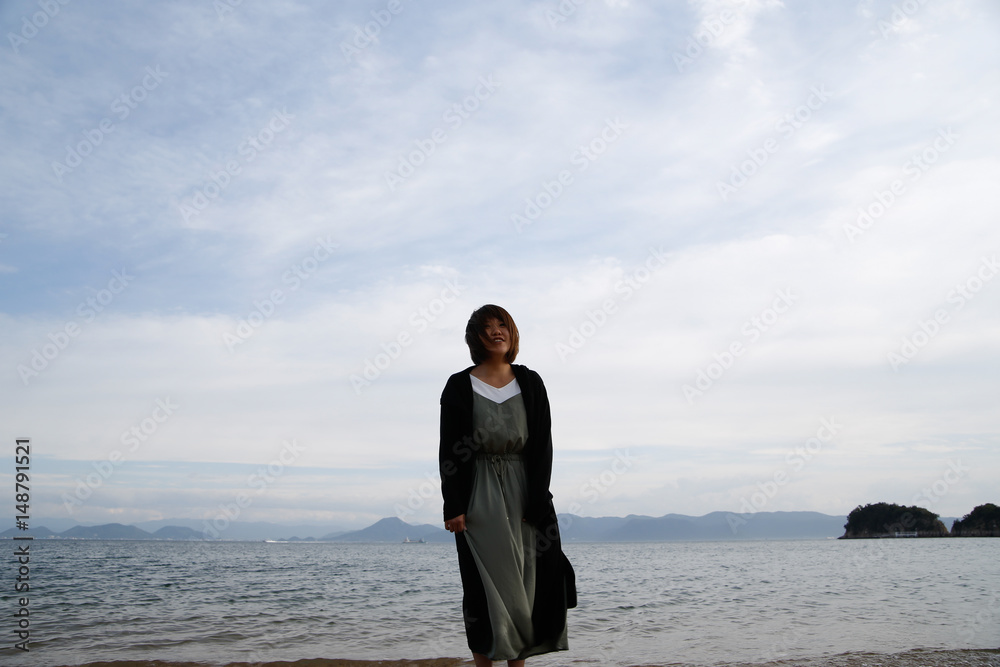 japanese young lady playing in the sea japanese young lady playing in the sea