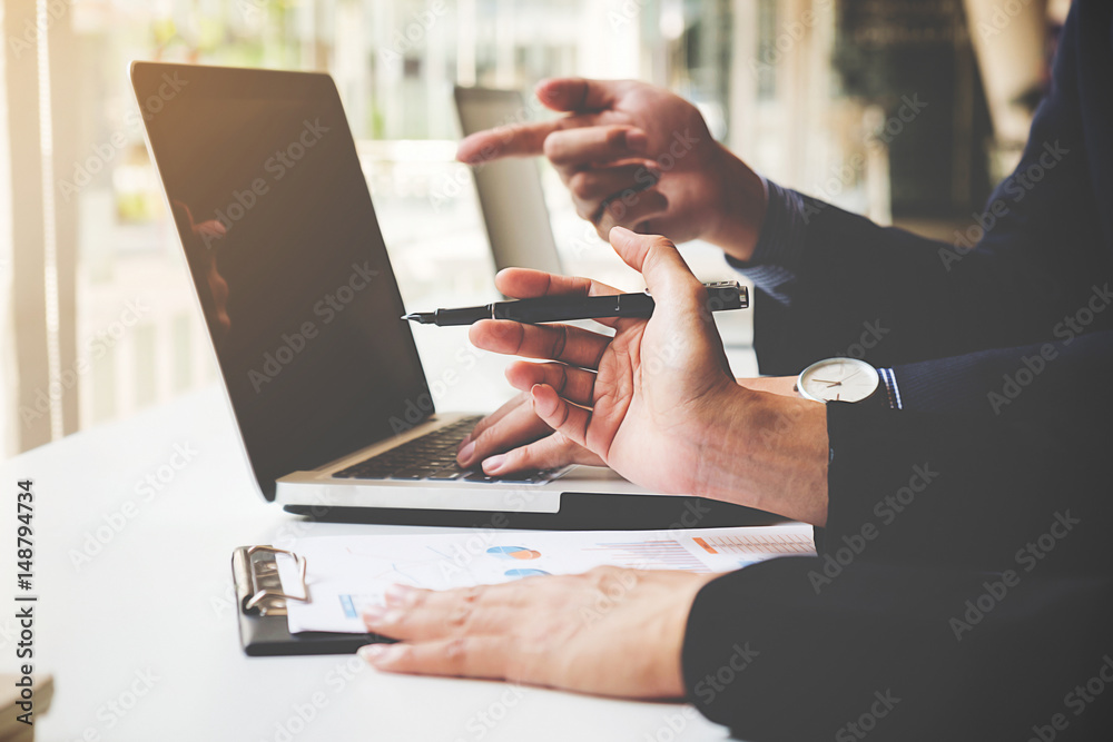 Fototapeta premium Business team meeting present. Professional investor working with new startup project. Digital tablet laptop computer design smart phone in office.
