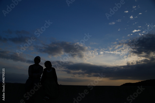 young attractive couple silhouette © lansa
