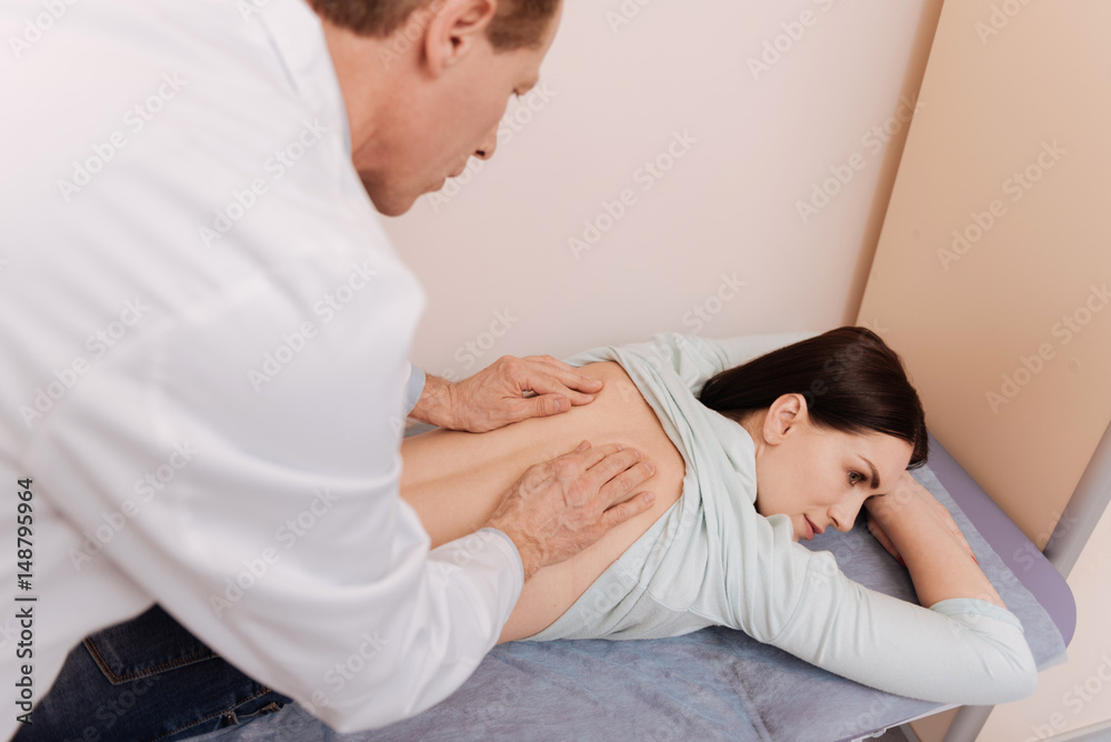 Great qualified specialist helping lady minifying the pain Great qualified specialist helping lady minifying the pain
