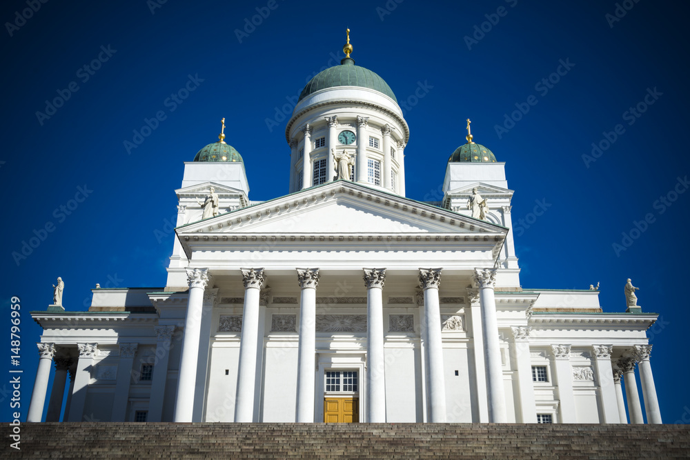 Helsinki cathedral in sunshine against clear blue sky