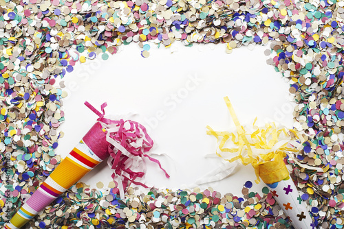 Background of confetti and over white background. Carnival, party, celebration. photo